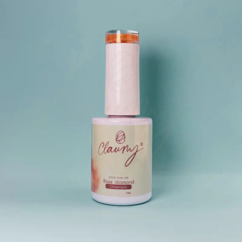 Base Diamond Champagne 15 ml · Gel autonivelante con destellos oro rosa